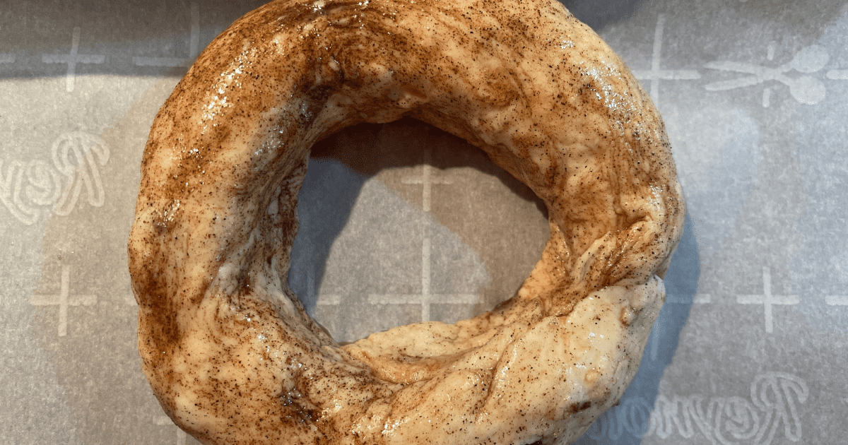 Cinnamon Raisin Bagels on a baking sheet